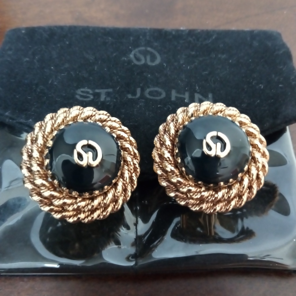 St. John earring clip on.  Gold and Black